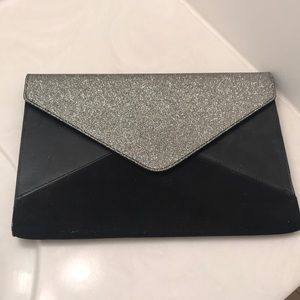 Black suede and silver glitter envelope clutch
